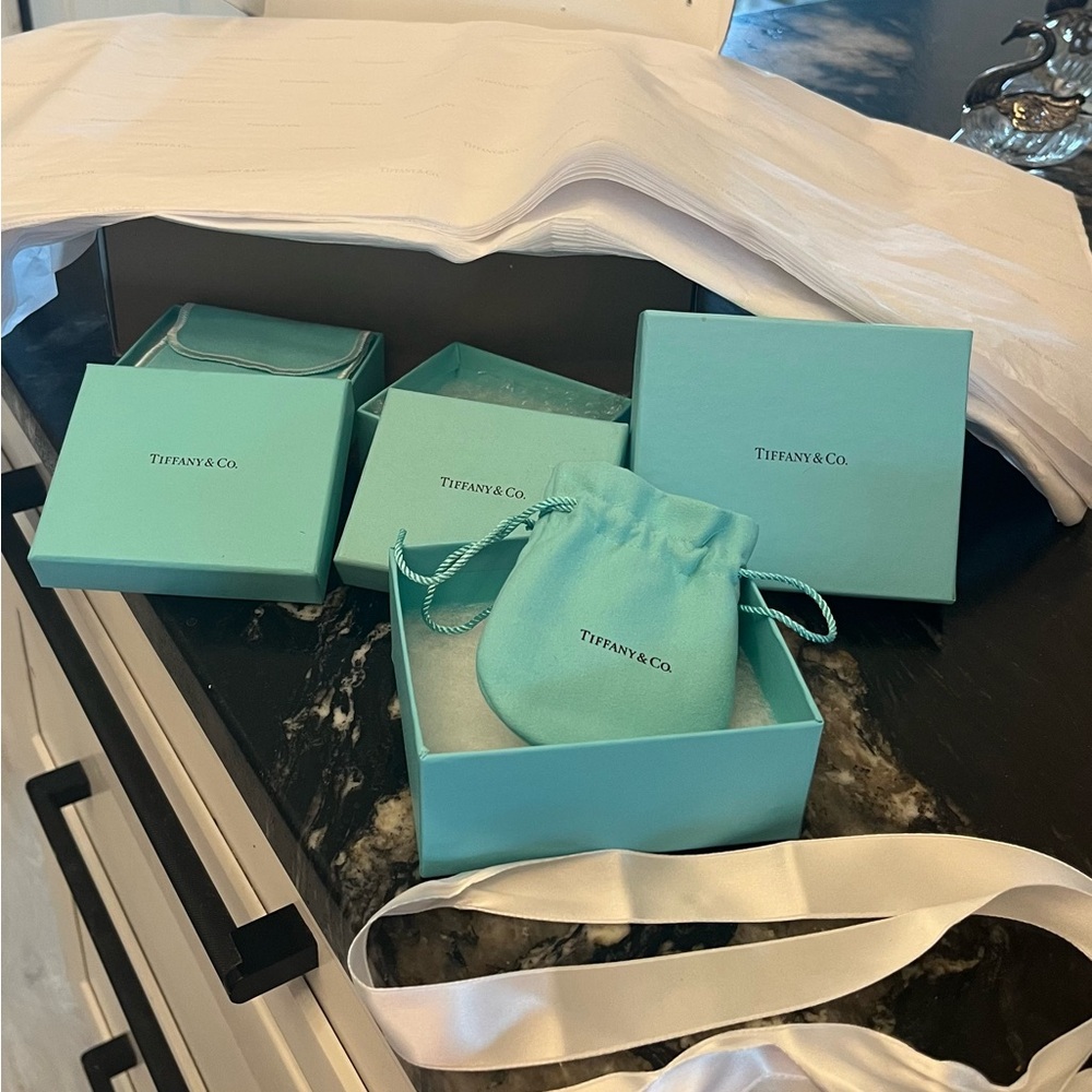 Original Tiffany package with ribbon.